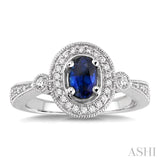 6x4 MM Oval Cut Sapphire and 1/5 Ctw Round Cut Diamond Ring in 14K White Gold