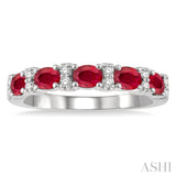 1/6 Ctw Oval Shape 4x3 MM Ruby and Round Cut Diamond Precious Band in 14K White Gold